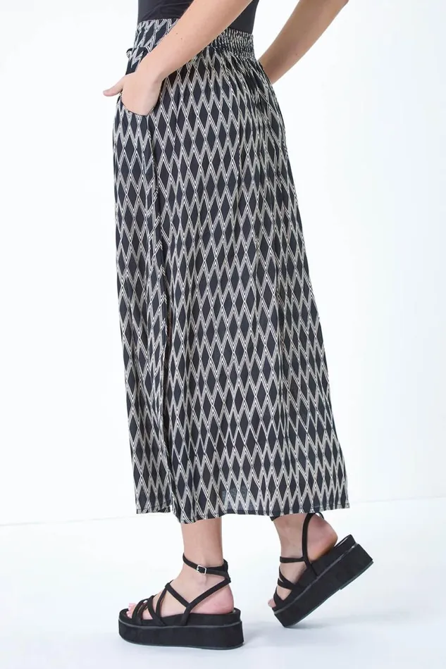 Women Black Printed Tie Front Pocket Skirt Roman Skirts