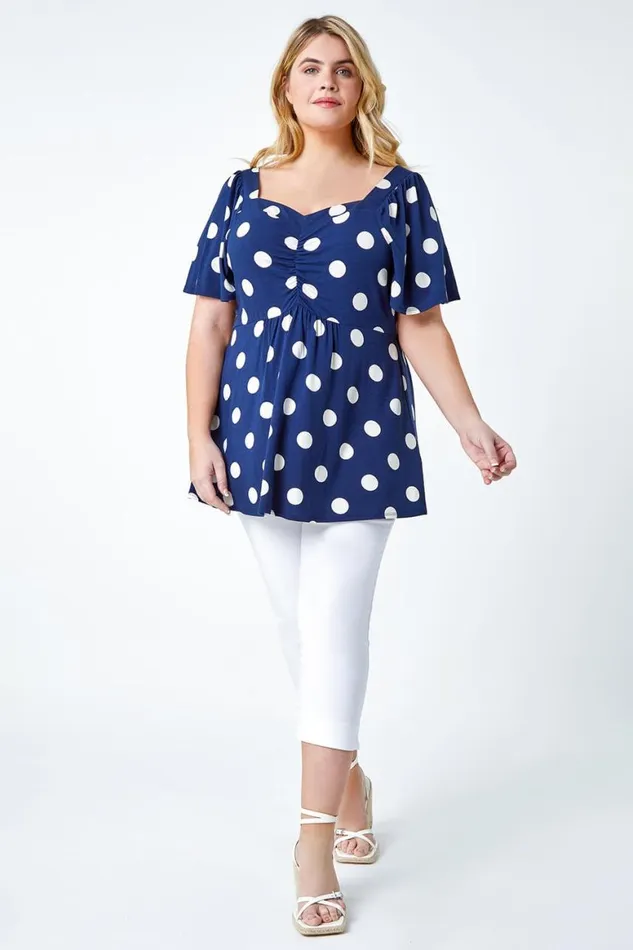 Women Navy Curve Polka Dot Peplum VNeck Stretch Top Roman Tops