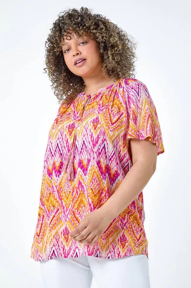 Women Orange Curve Zig Zag Print Tie Tassel Top Roman Tops