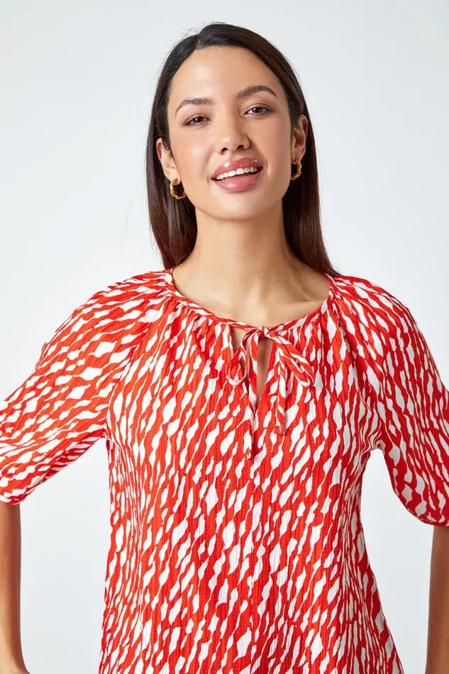 Women Red Abstract Print Tie Front VNeck Stretch Top Roman Tops